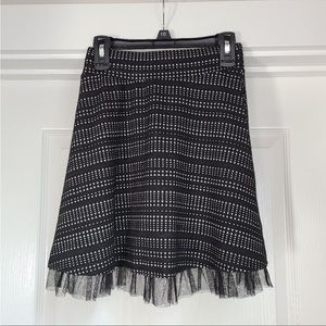 Black and white dot skirt with tule.